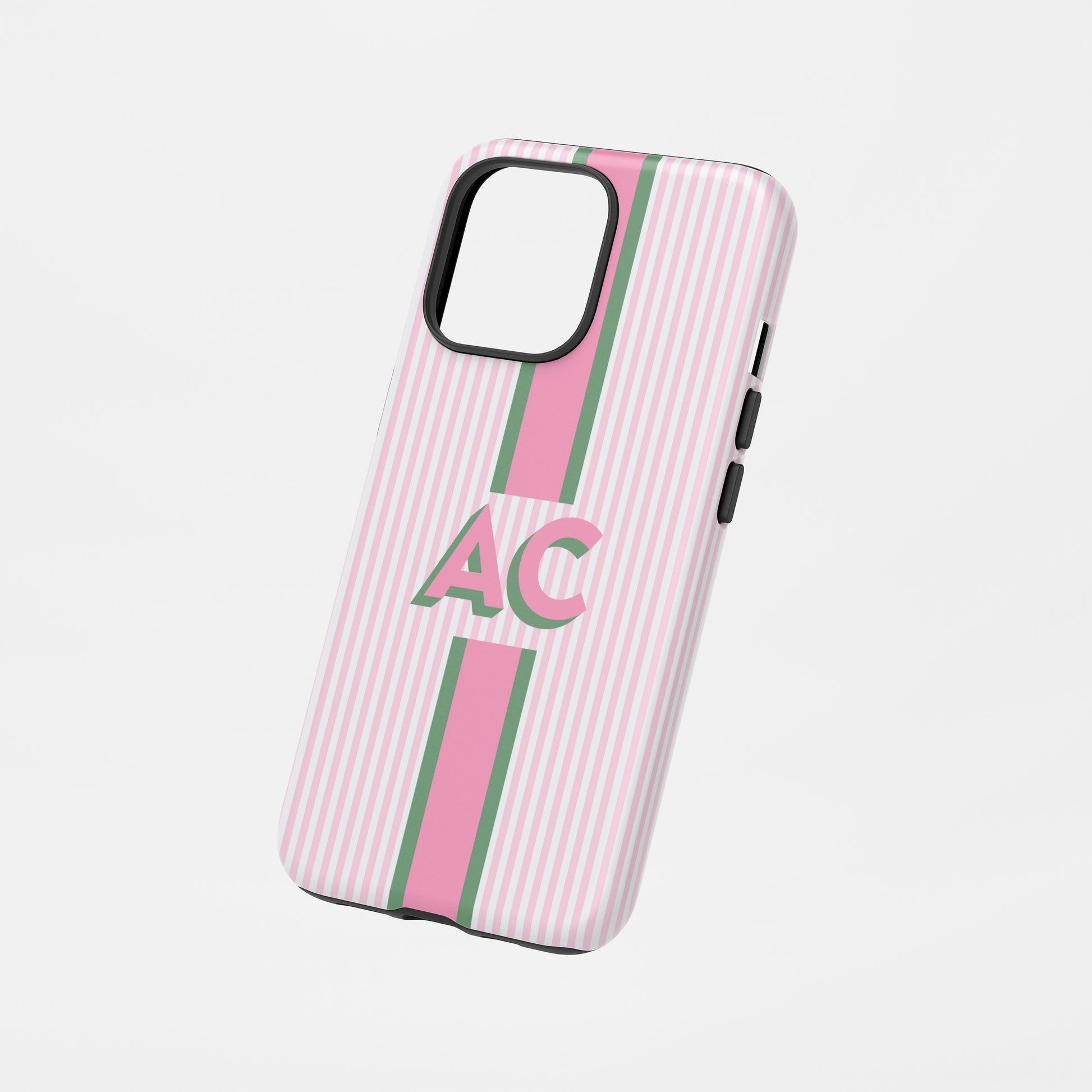 Pink and green striped phone case with bold AC monogram.