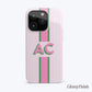 Pink and green striped phone case with large "AC" monogram, glossy finish.