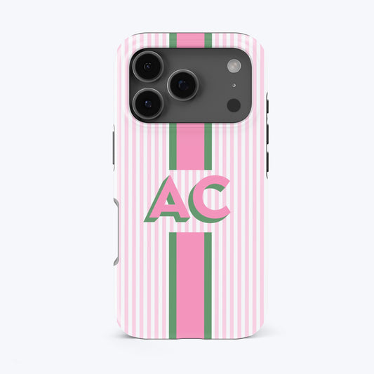 Phone case with pink and green stripes and AC monogram.